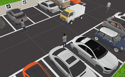 3. Image depicting a high-risk parking scenario, such as navigating through a crowded parking lot with pedestrians and obstacles.